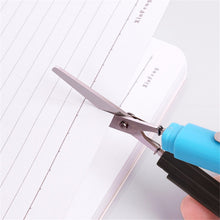 Scissor designed to look like a pen, useful for various cutting tasks