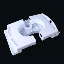 White plastic folding squat stool with anti-slip features.