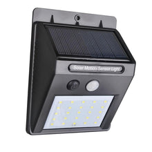 Solar LED light with motion sensor for outdoor use.